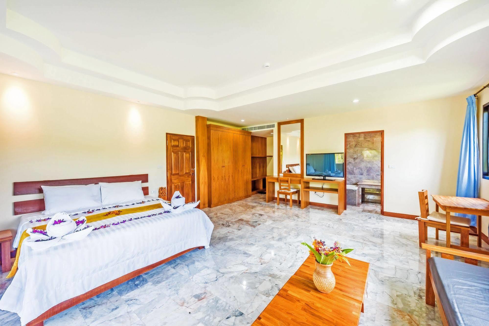 The Windmill Phuket Hotel Rawai Extérieur photo