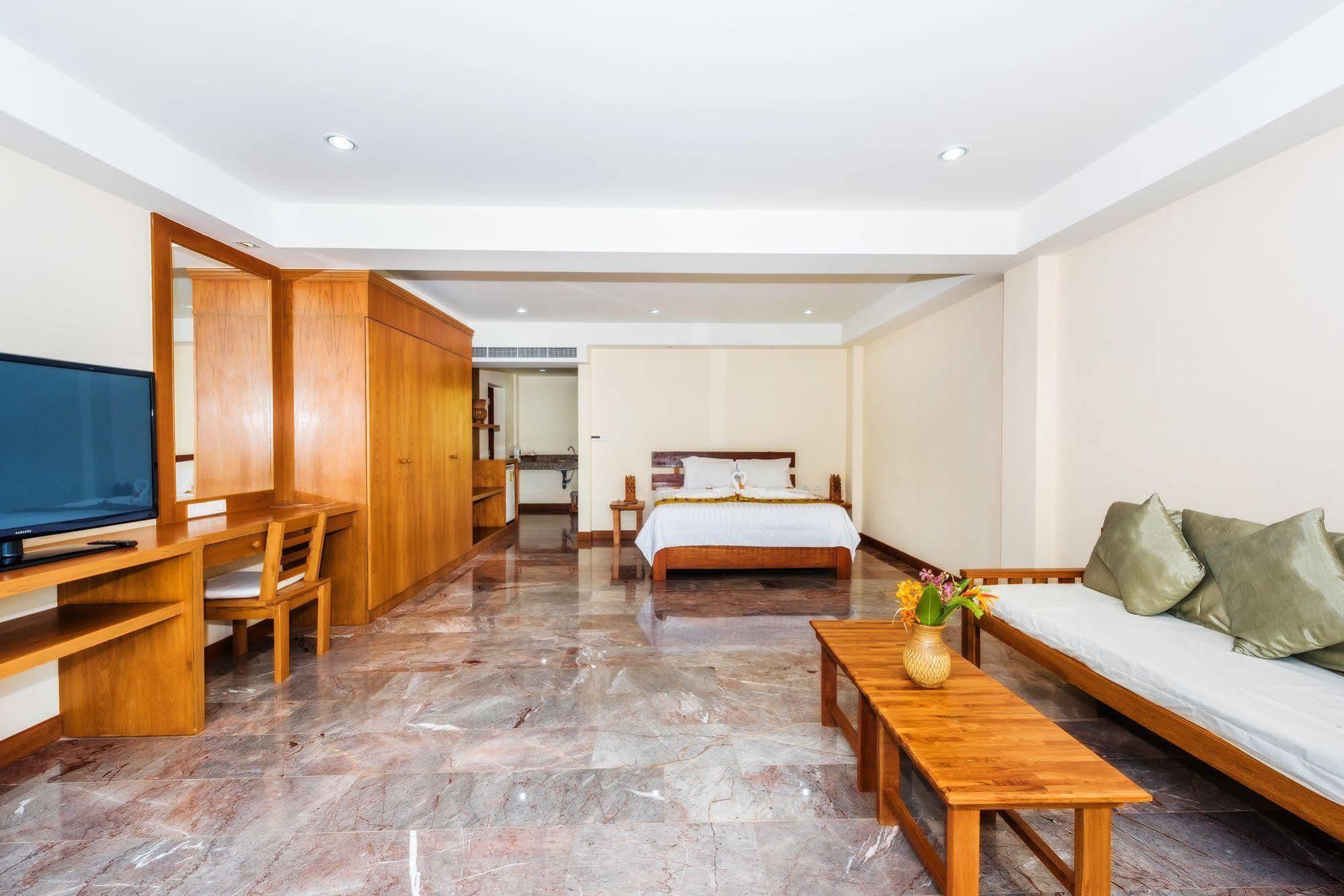 The Windmill Phuket Hotel Rawai Extérieur photo