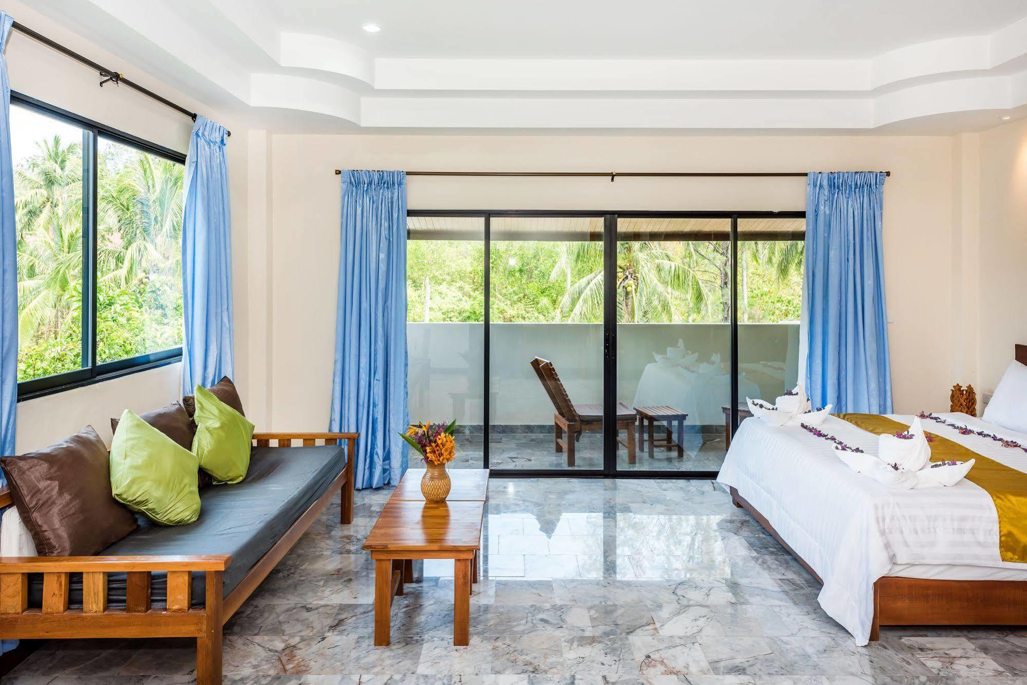 The Windmill Phuket Hotel Rawai Extérieur photo