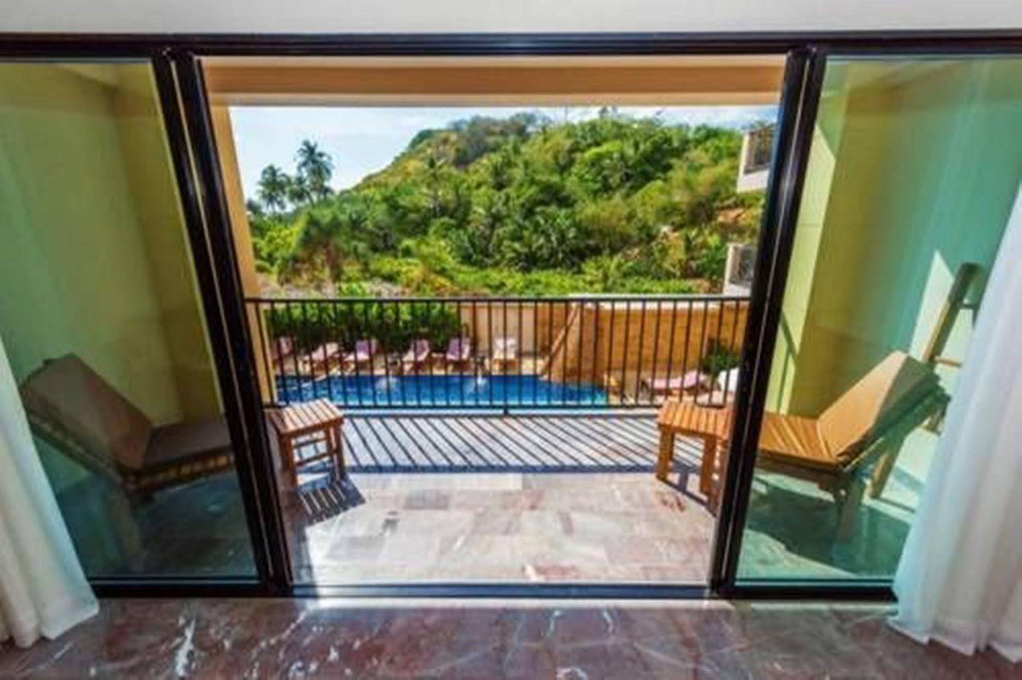 The Windmill Phuket Hotel Rawai Extérieur photo
